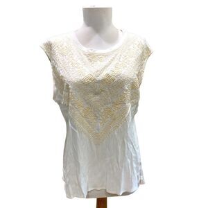 White cream embroidered flowers side slits no fabric content possibly polyester